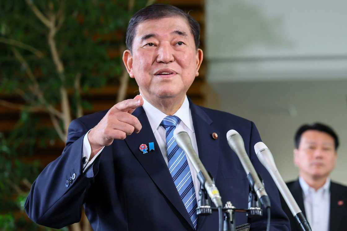 Japan's Prime Minister Shigeru Ishiba responds to questions after a telephone conversation with US President Donald Trump, at the prime minister's office in Tokyo on May 23, 2025