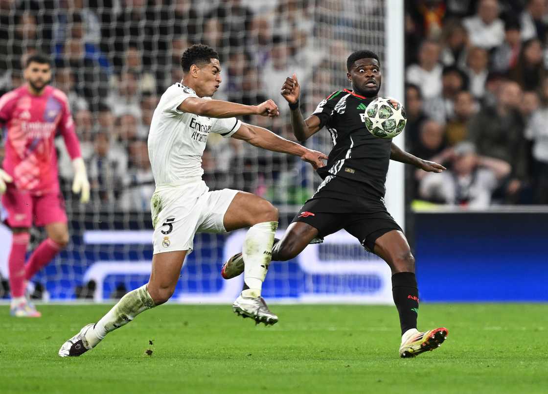 Ghana's Thomas Partey of Arsenal is challenged by Jude Bellingham in the Real Madrid 1 Arsenal 2 UEFA CL match on April 16, 2025 in Madrid, Spain Ghana's Thomas Partey of Arsenal is challenged by Jude Bellingham in the Real Madrid 1 Arsenal 2 UEFA CL match on April 16, 2025 in Madrid, Spain