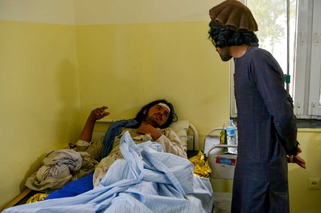 An Afghan man is treated inside a hospital in Sharan An Afghan man is treated inside a hospital in Sharan