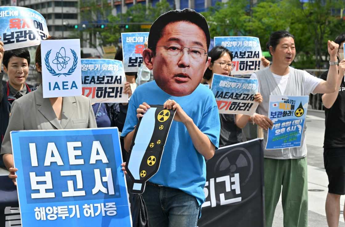 South Korean activists protest the IAEA report condoning the Fukushima water release plan South Korean activists protest the IAEA report condoning the Fukushima water release plan