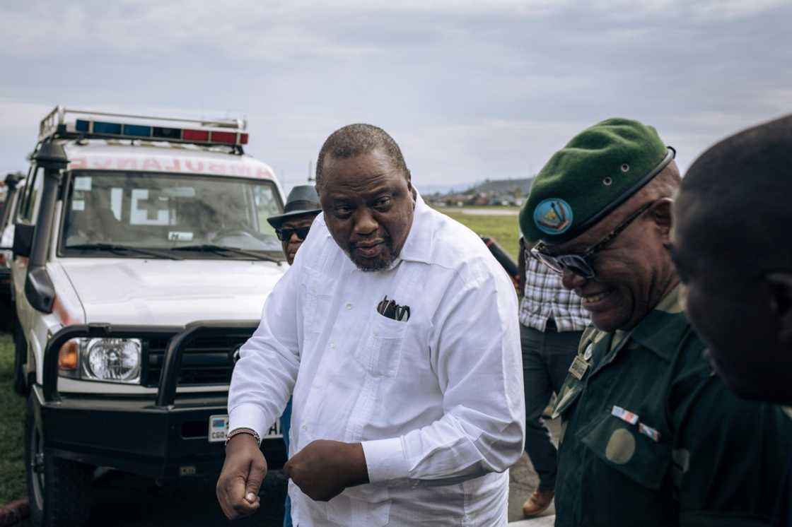 Kenyatta (in white) visiting Goma this week Kenyatta (in white) visiting Goma this week