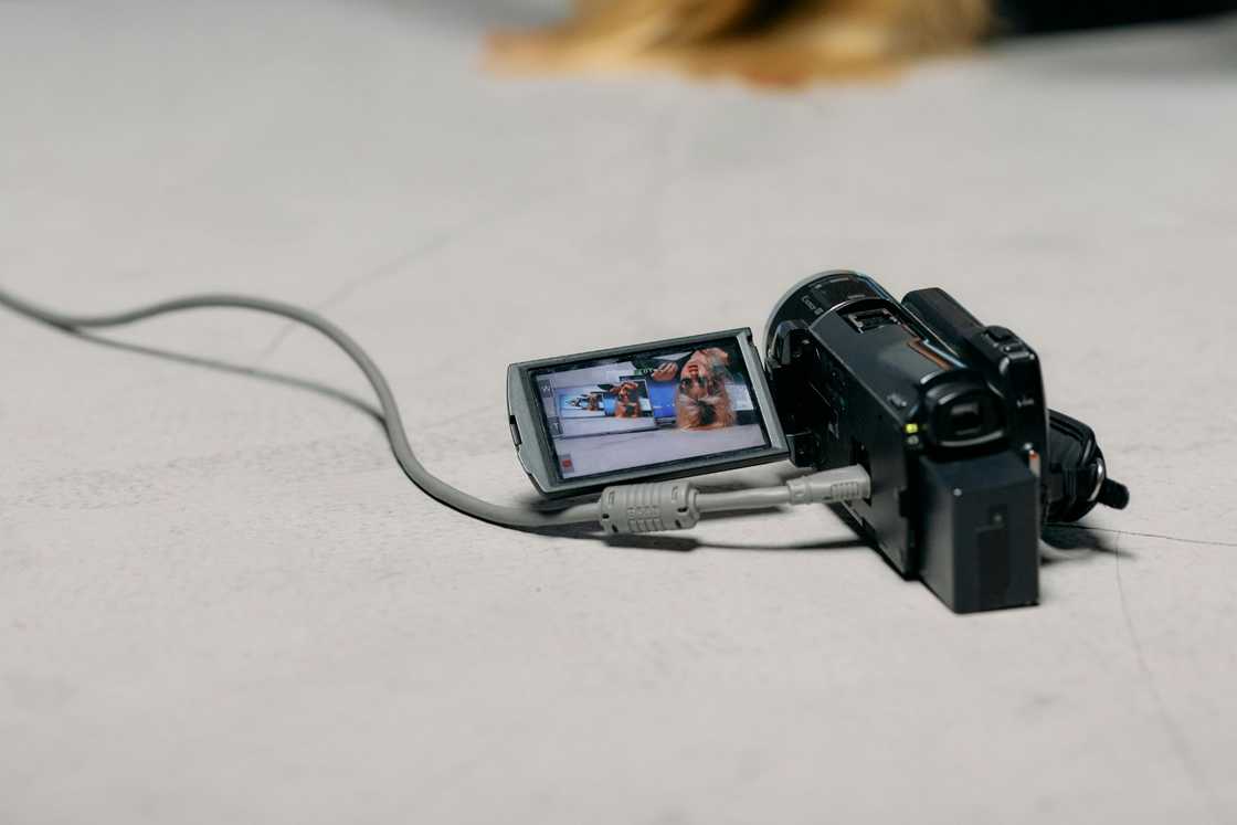 A photo of a video camera on the floor A photo of a video camera on the floor