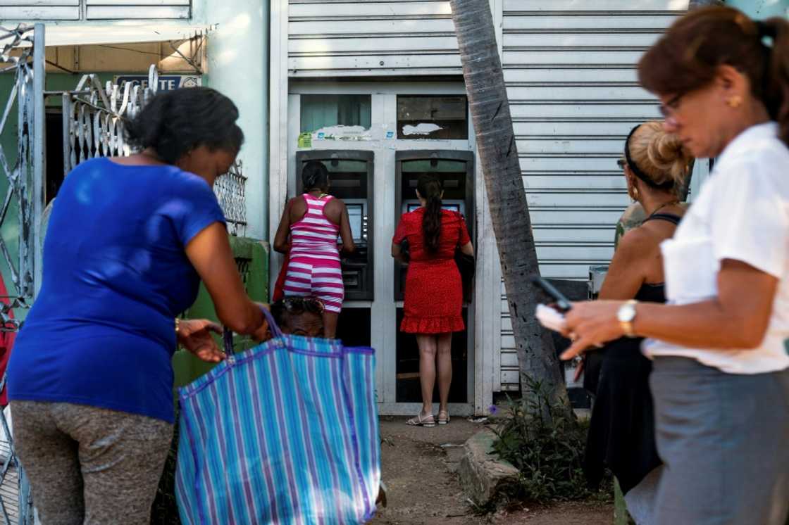 Soaring prices and the loss of value of banknotes mean Cubans have to cram cash into a bag or backpack to pay even minor purchases Soaring prices and the loss of value of banknotes mean Cubans have to cram cash into a bag or backpack to pay even minor purchases