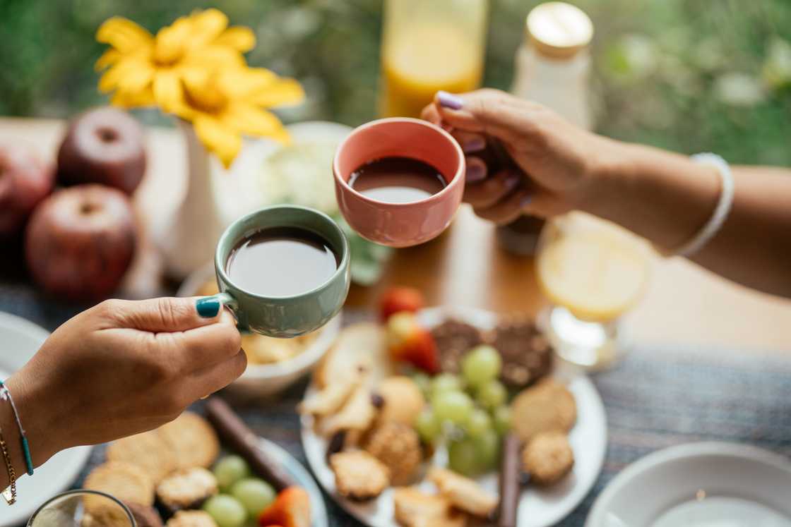 Young couple taking coffee