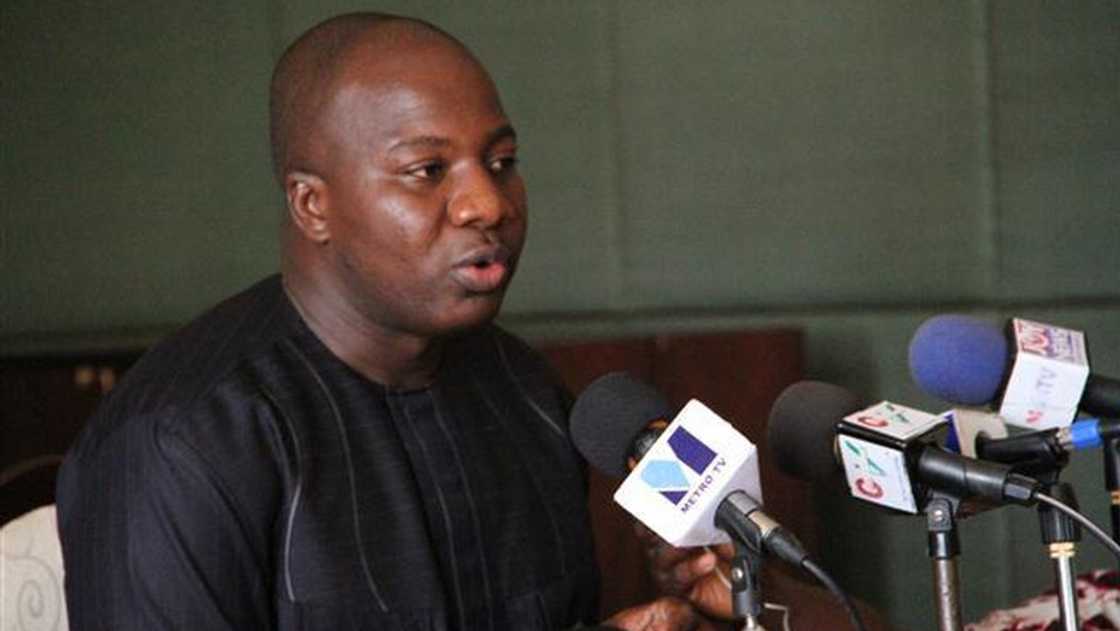 A man wearing a black shirt A man wearing a black shirt