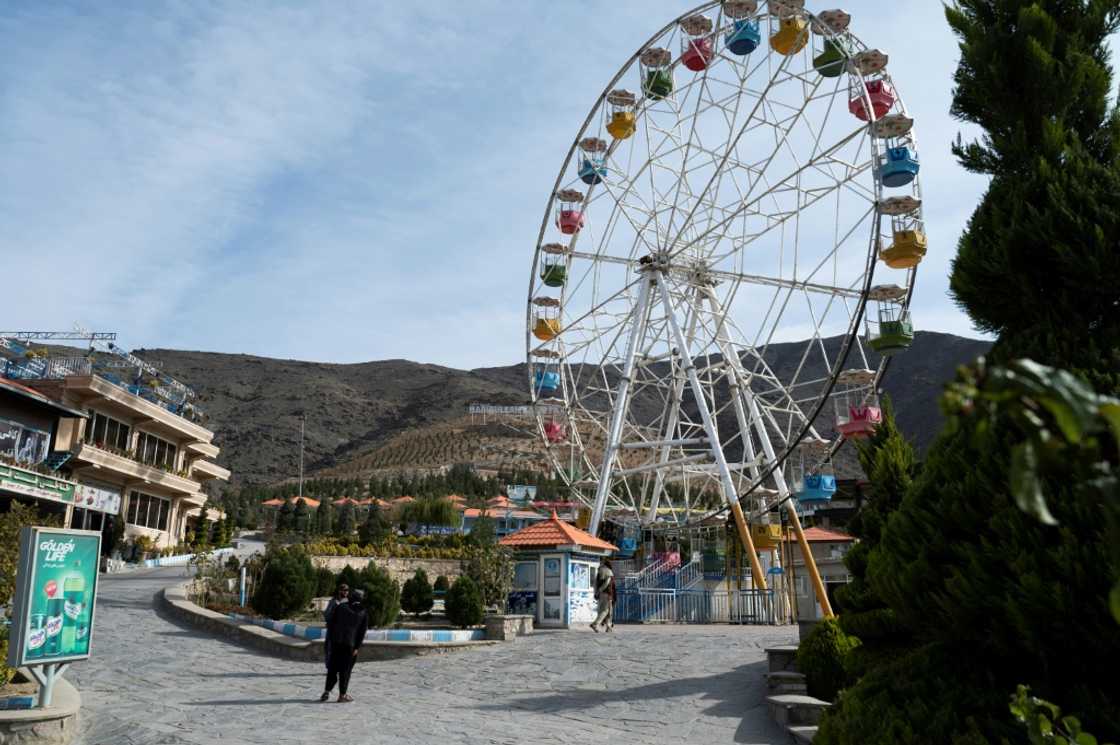 Taliban guards stand in the Habibullah Zazai Park on the outskirts of Kabul Taliban guards stand in the Habibullah Zazai Park on the outskirts of Kabul