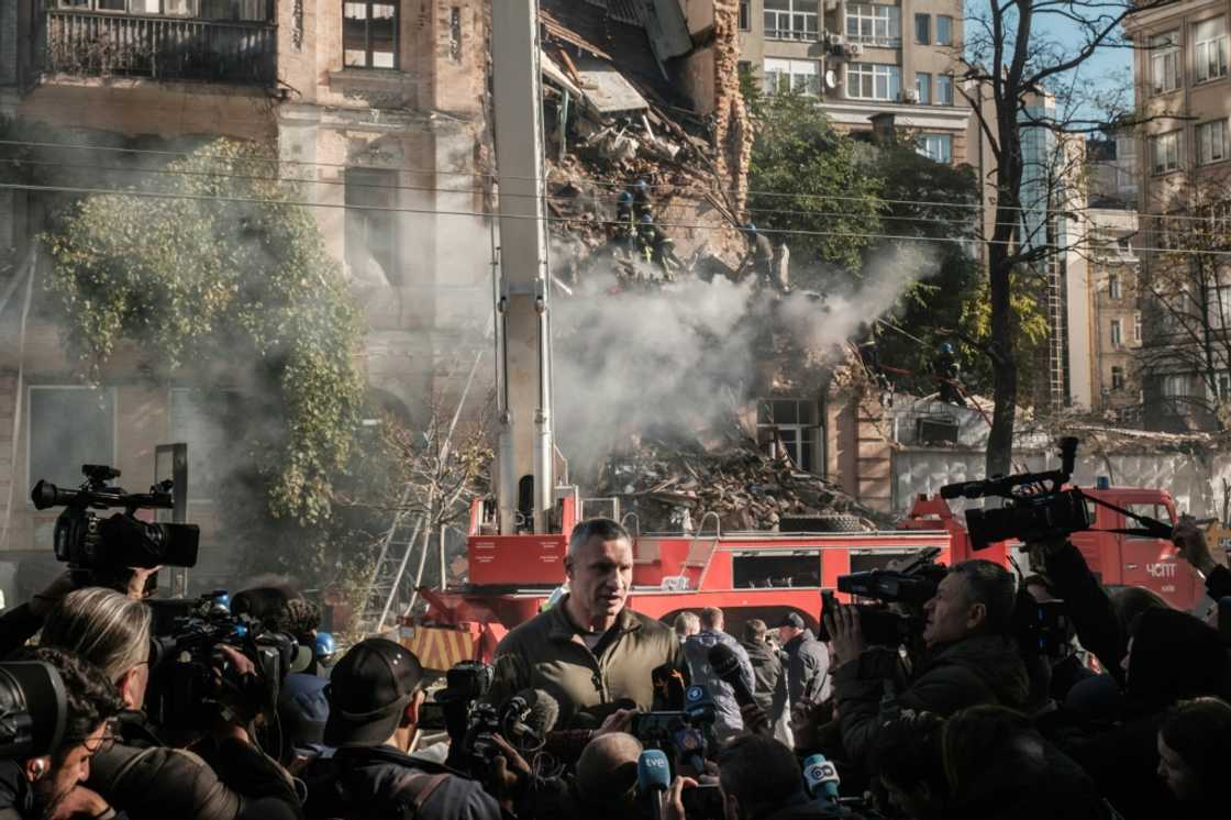 Kyiv mayor Vitali Klitschko speaks to reporters after a drone strike