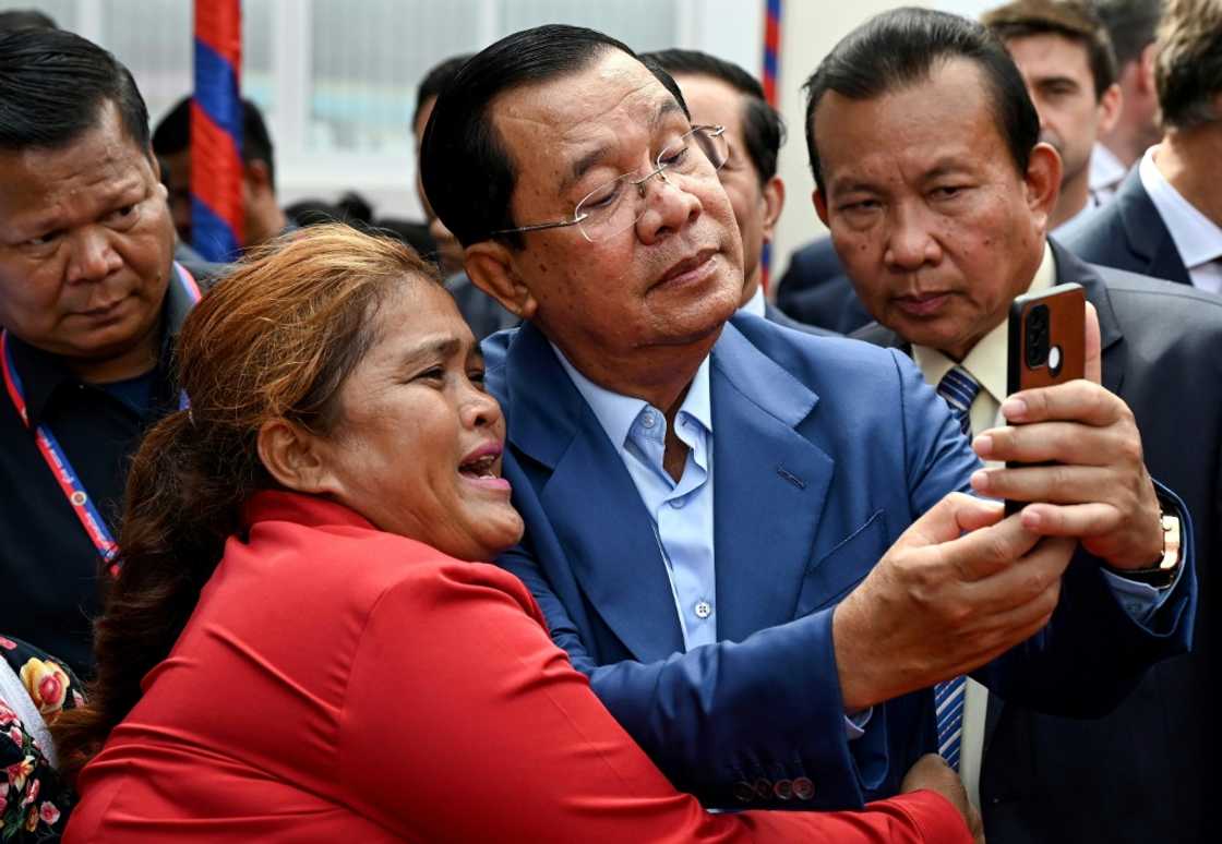 Cambodian Prime Minister Hun Sen (C) has long been a prolific Facebook user Cambodian Prime Minister Hun Sen (C) has long been a prolific Facebook user