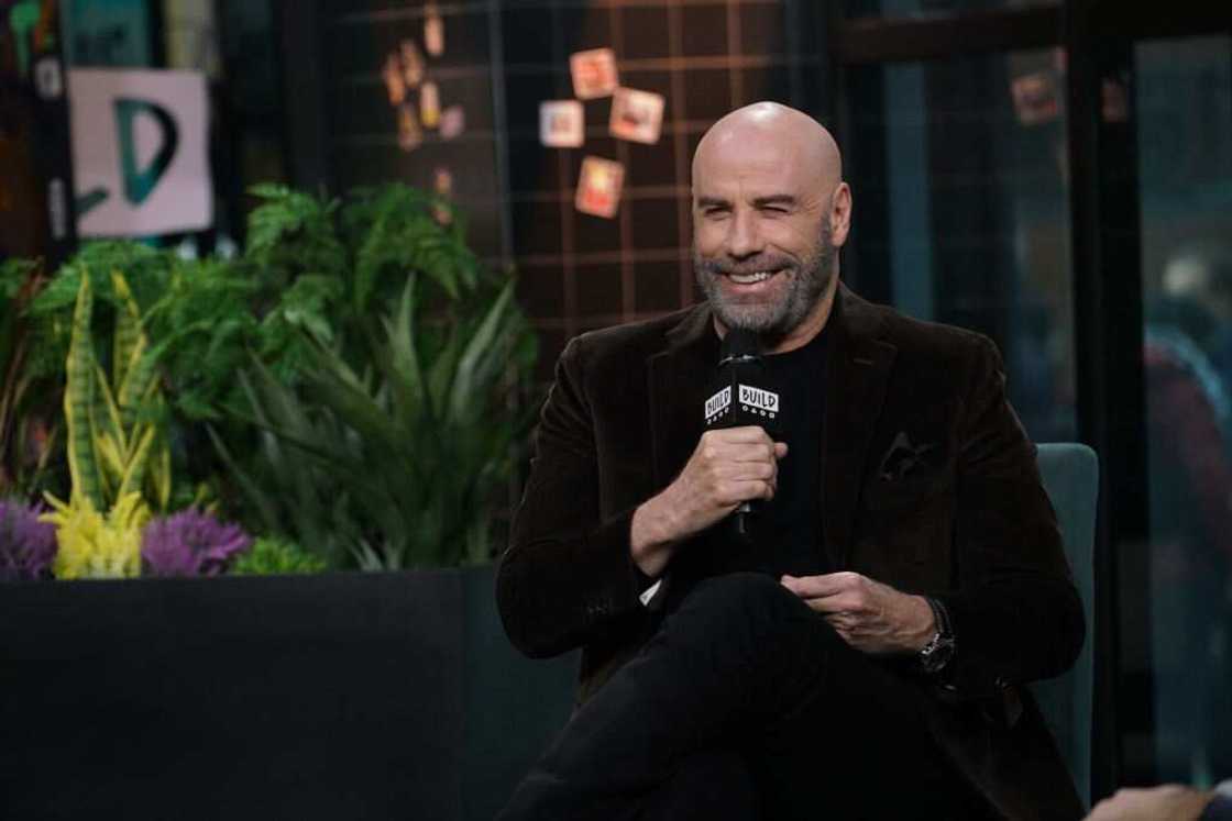 How old was John Travolta in Grease? How old was John Travolta in Grease?