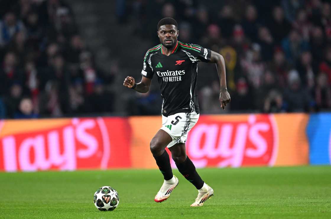 Thomas Partey of Arsenal runs with the ball during the UEFA Champions League 2024/25 Round of 16 first leg match between PSV and Arsenal FC at PSV Stadion on March 04, 2025 in Eindhoven, Netherlands Thomas Partey of Arsenal runs with the ball during the UEFA Champions League 2024/25 Round of 16 first leg match between PSV and Arsenal FC at PSV Stadion on March 04, 2025 in Eindhoven, Netherlands
