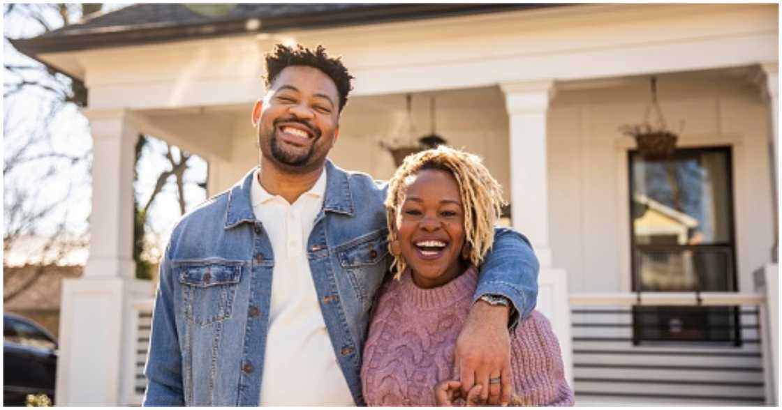 A couple acquire a new home A couple acquire a new home