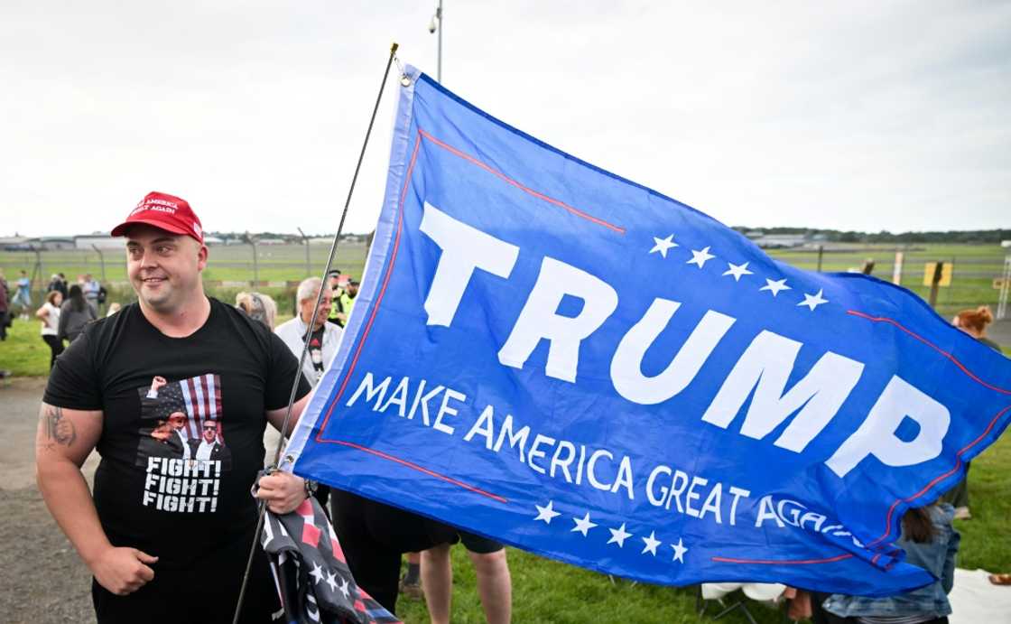 Some Trump supporters turned out to see Trump's plane land at Prestwick Some Trump supporters turned out to see Trump's plane land at Prestwick