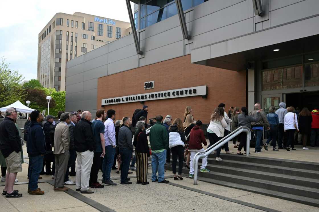 Members of the public queue to enter a Delaware court to watch a major defamation trial between Dominion Voting Systems and Fox News on April 18, 2023 Members of the public queue to enter a Delaware court to watch a major defamation trial between Dominion Voting Systems and Fox News on April 18, 2023