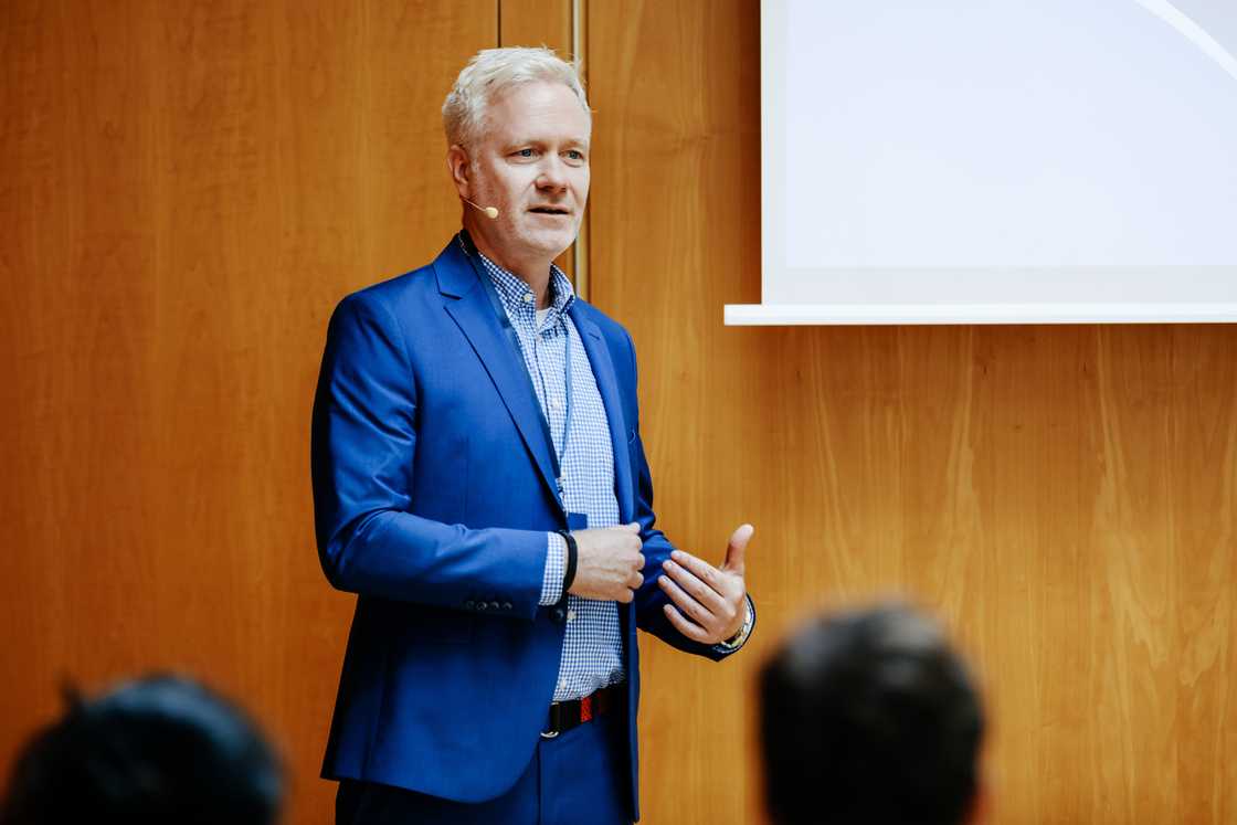 A speaker at a business conference