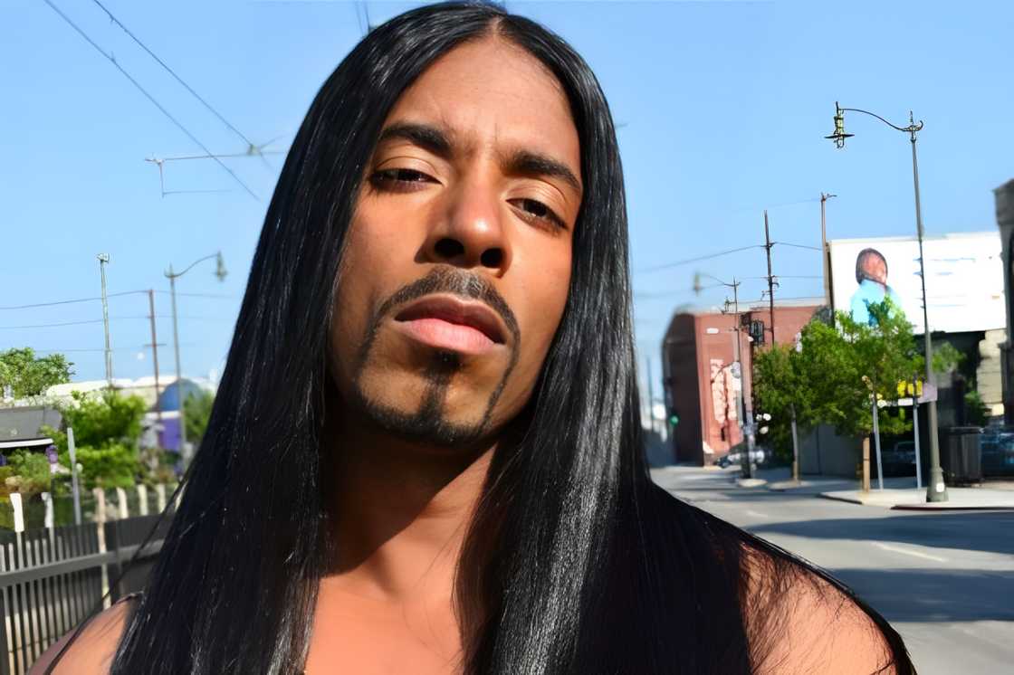 A black-American man with a sleek and straight style A black-American man with a sleek and straight style