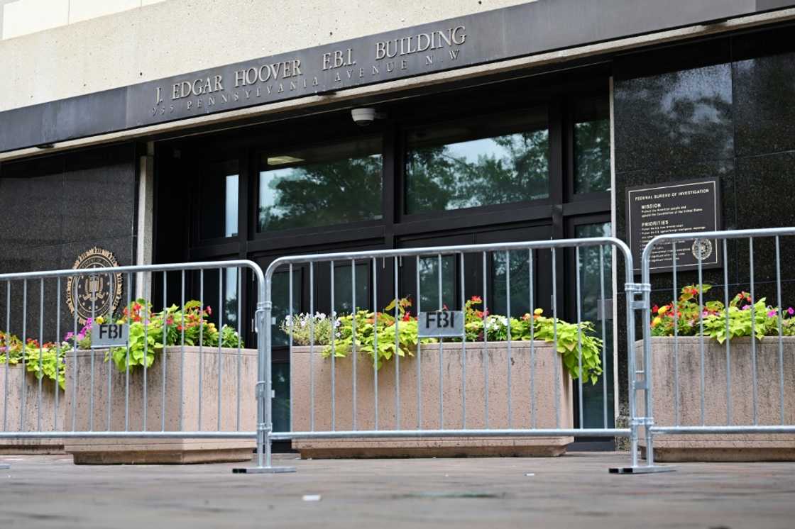Security fencing outside the FBI headquarters in Washington, DC after threats rose following the raid on Donald Trump's home. Security fencing outside the FBI headquarters in Washington, DC after threats rose following the raid on Donald Trump's home.