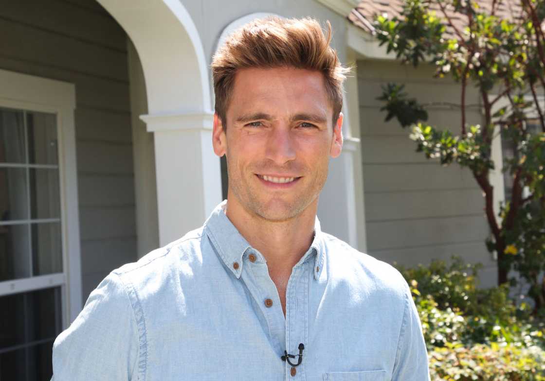 Andrew Walker in blue shirt
