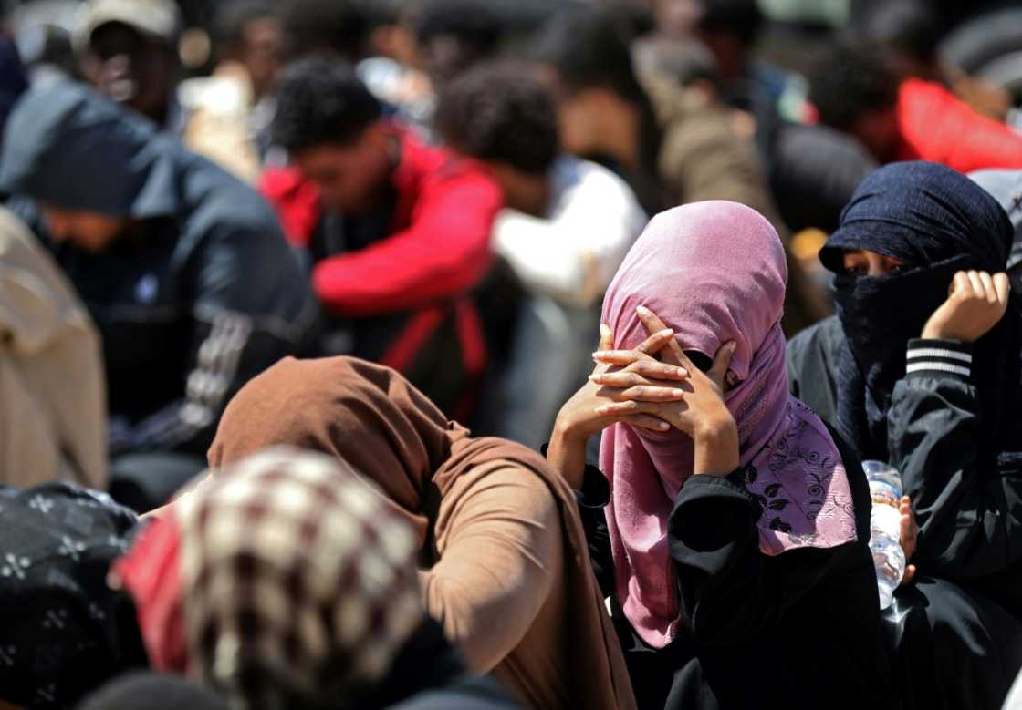 Migrants intercepted by the Libyan coast guard as they attempted to reach are held in a detention camp in Surman, west of the capital Tripoli, pending possible deportation