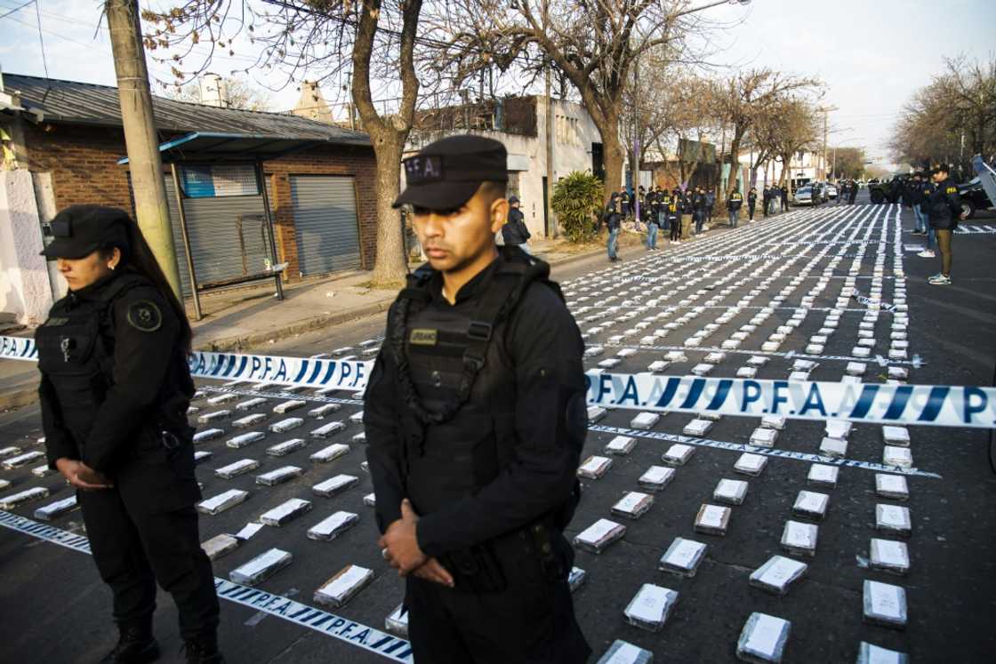 Argentine federal police officers guard cocaine packets seized in the city of Rosario Argentine federal police officers guard cocaine packets seized in the city of Rosario