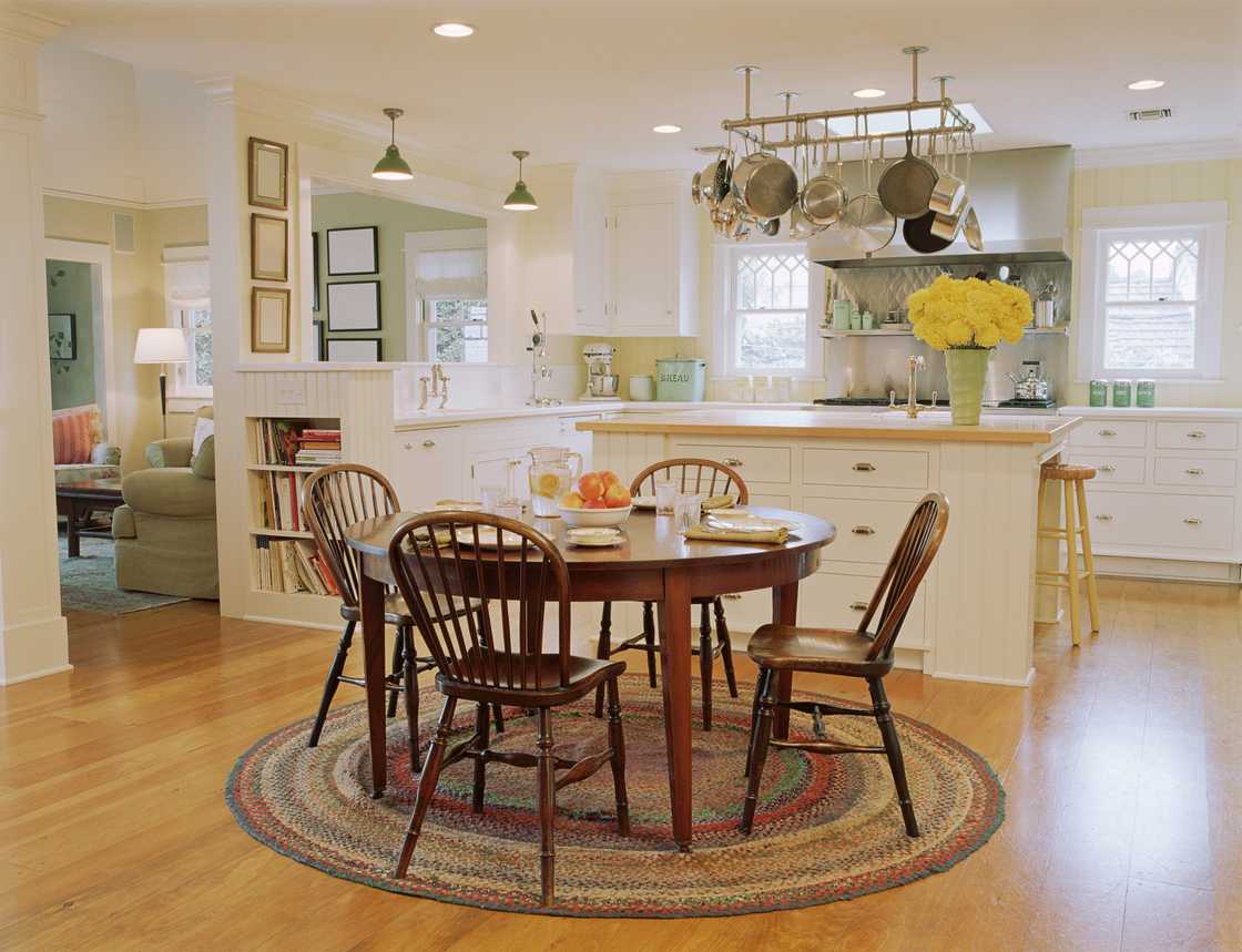 Wooden table and chairs in a traditional kitchen Wooden table and chairs in a traditional kitchen