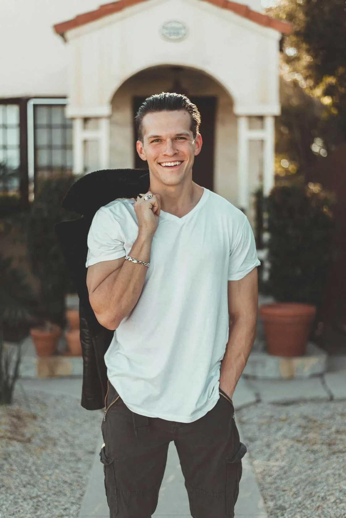 A smiling man looking at the camera