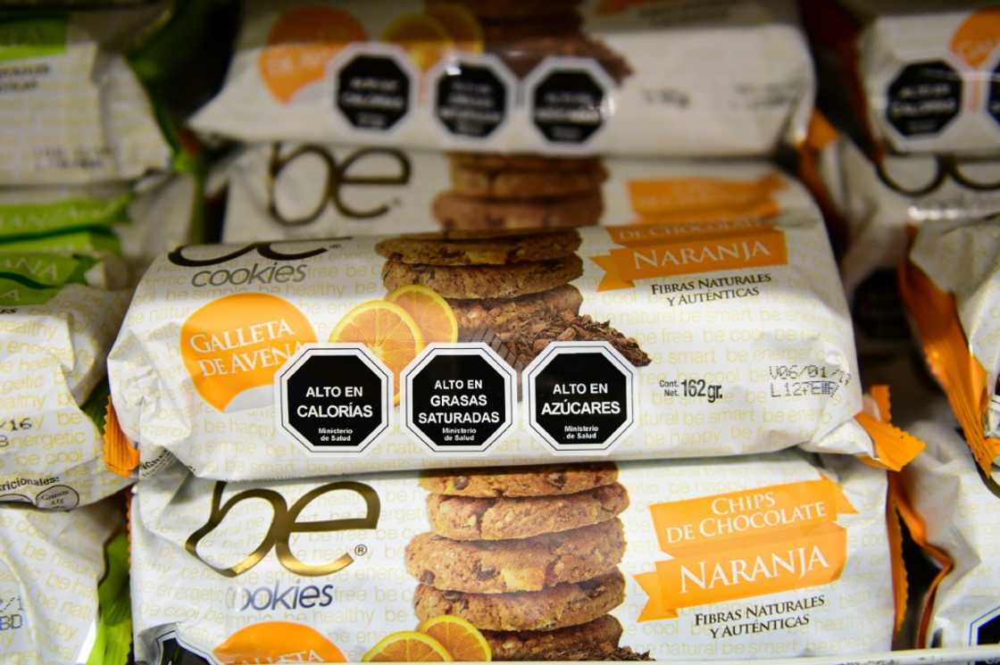 Food labels in Chile warn of high content in sugar, calories and saturated fat Food labels in Chile warn of high content in sugar, calories and saturated fat