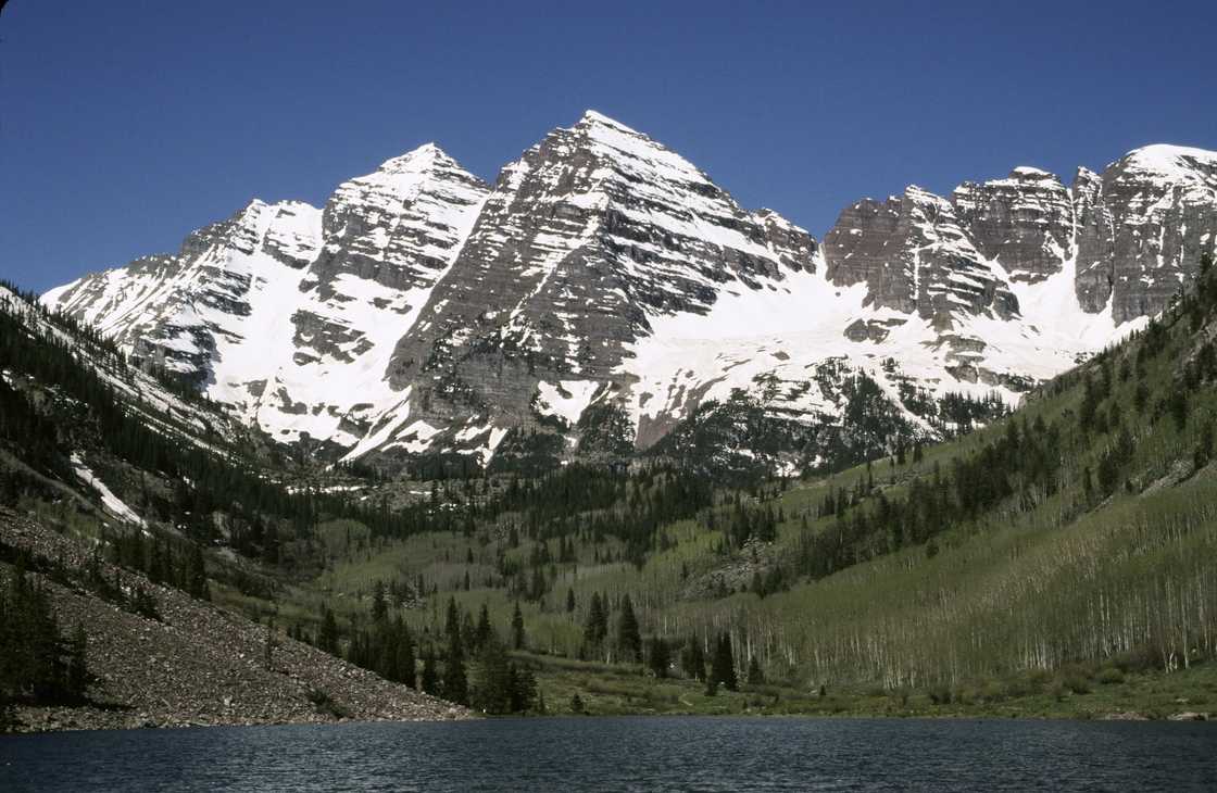 The snow-covered peaks of the Maroon Bells.