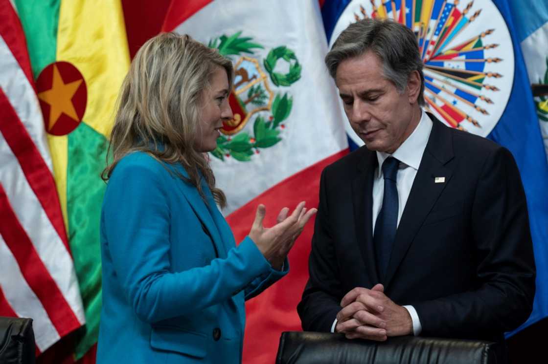 US Secretary of State Antony Blinken speaks with Canadian Foreign Minister Melanie Joly during a meeting about aid policy to Haiti during a meeting of the Organization of American States in Lima on October 6, 2022 US Secretary of State Antony Blinken speaks with Canadian Foreign Minister Melanie Joly during a meeting about aid policy to Haiti during a meeting of the Organization of American States in Lima on October 6, 2022