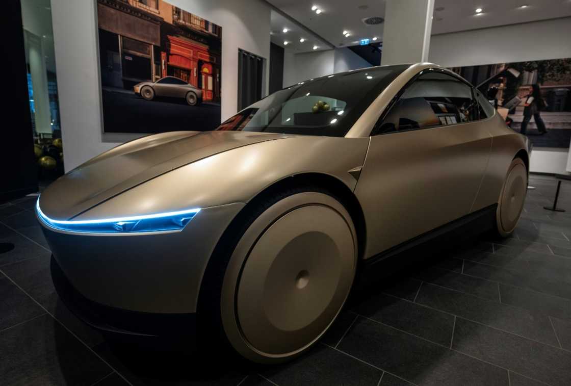 A prototype of US car manufacturer Tesla's self-driving electric Cybercab is seen in Tesla's showroom in a Berlin Mall on November 20, 2024 A prototype of US car manufacturer Tesla's self-driving electric Cybercab is seen in Tesla's showroom in a Berlin Mall on November 20, 2024