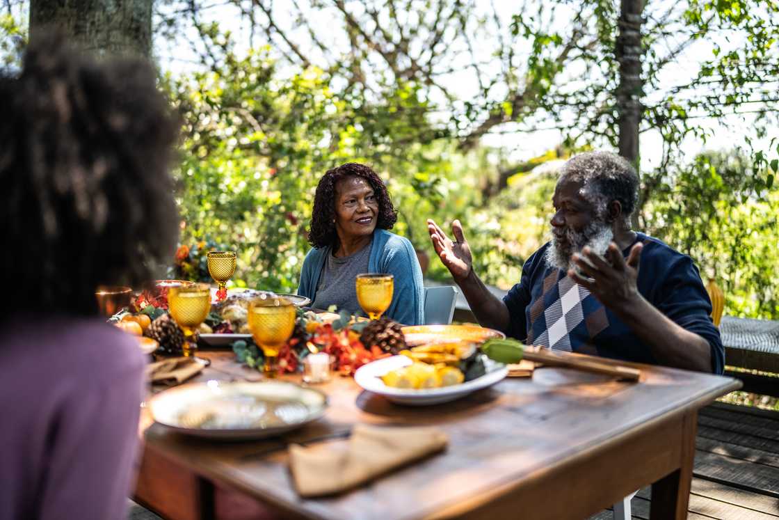 A man is giving a speech during family gathering