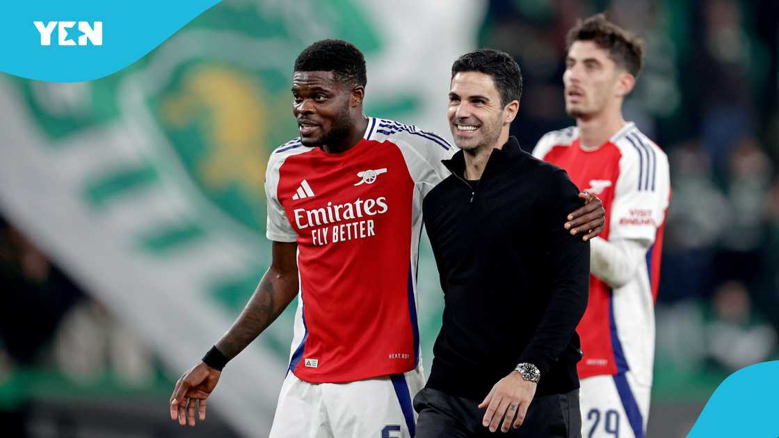 Thomas Partey of Arsenal, coach Mikel Arteta of Arsenal celebrating the victory during the UEFA Champions League match between Sporting CP v Arsenal at the Estadio Jose Alvalade on November 26, 2024 in Lisbon Portugal Thomas Partey of Arsenal, coach Mikel Arteta of Arsenal celebrating the victory during the UEFA Champions League match between Sporting CP v Arsenal at the Estadio Jose Alvalade on November 26, 2024 in Lisbon Portugal