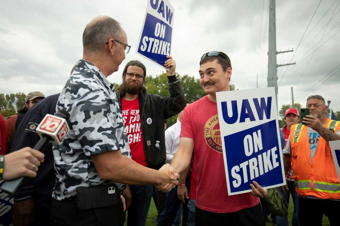 United Auto Workers President Shawn Fain greets UAW members as they strike the General Motors Lansing Delta Assembly Plant in September 2023 United Auto Workers President Shawn Fain greets UAW members as they strike the General Motors Lansing Delta Assembly Plant in September 2023