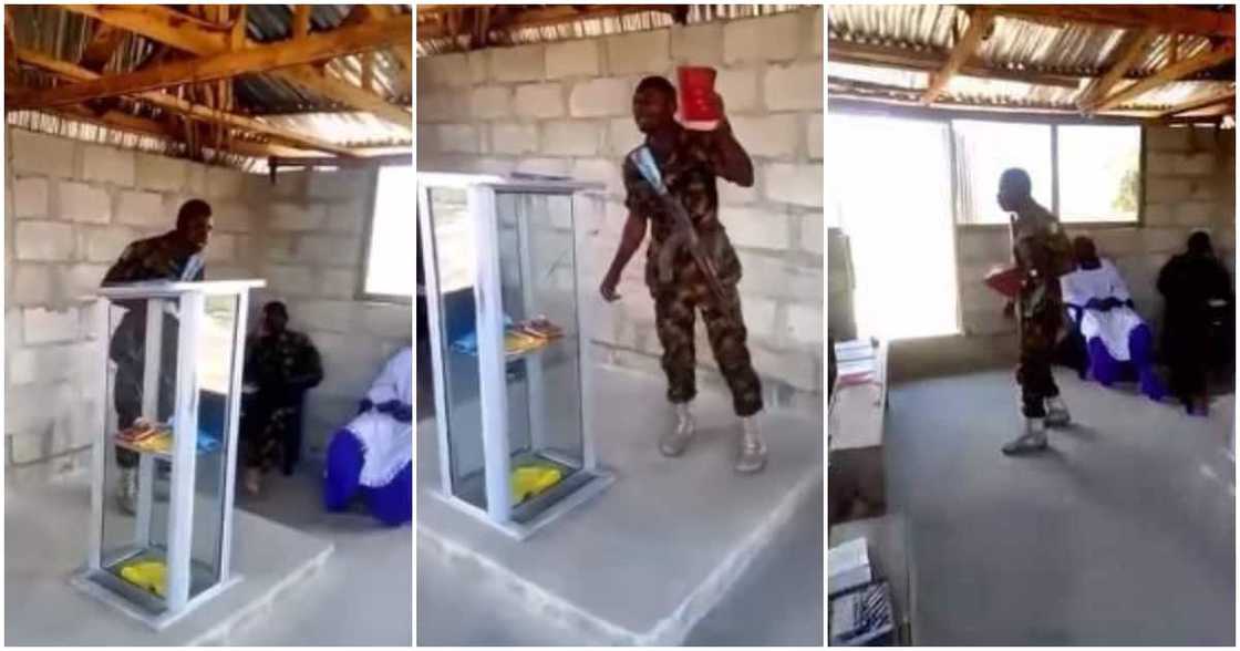 Soldier in uniform, rifle to his chest, preaching on altar, video Soldier in uniform, rifle to his chest, preaching on altar, video