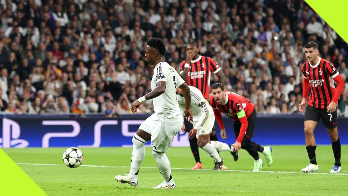 Real Madrid's Vinicius Jr notched a gorgeous penalty against AC Milan in the UEFA Champions League. Real Madrid's Vinicius Jr notched a gorgeous penalty against AC Milan in the UEFA Champions League.