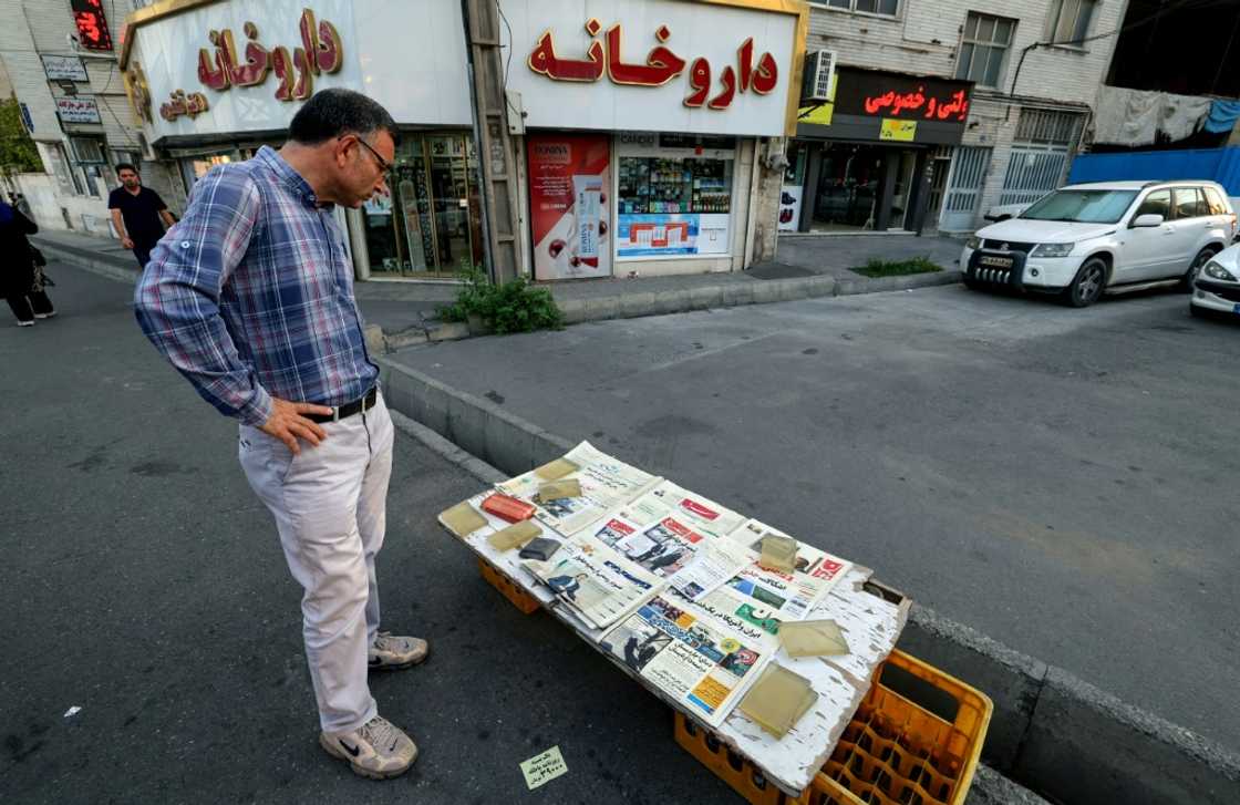 Iran's Etemad newspaper bears the title "The Night of the End of the JCPOA" at a stall in the capital Tehran on August 16, 2022 Iran's Etemad newspaper bears the title "The Night of the End of the JCPOA" at a stall in the capital Tehran on August 16, 2022