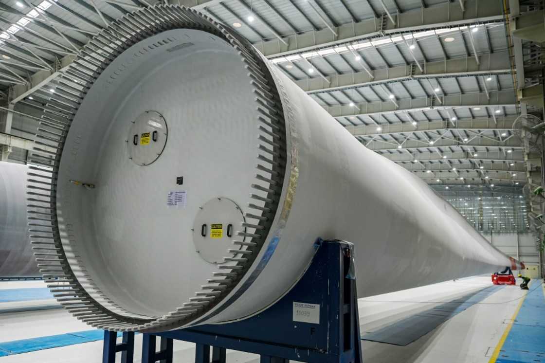 In Mundra, site of India's largest commercial port -- run by another arm of the Adani empire -- it is manufacturing key components for its aggressive solar and wind energy foray, including colossal wind turbine blades nearly 80 metres long In Mundra, site of India's largest commercial port -- run by another arm of the Adani empire -- it is manufacturing key components for its aggressive solar and wind energy foray, including colossal wind turbine blades nearly 80 metres long