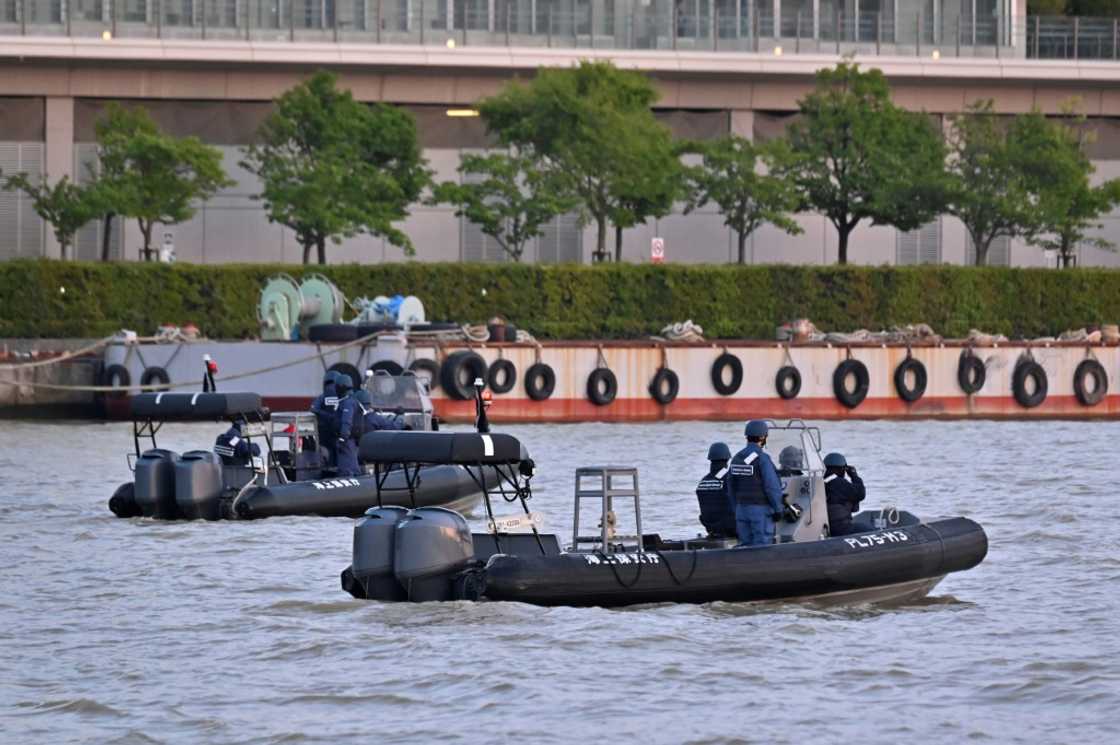 The Japan Coast Guard patrols the Shinano River that flows by venues hosting the G7 finance talks