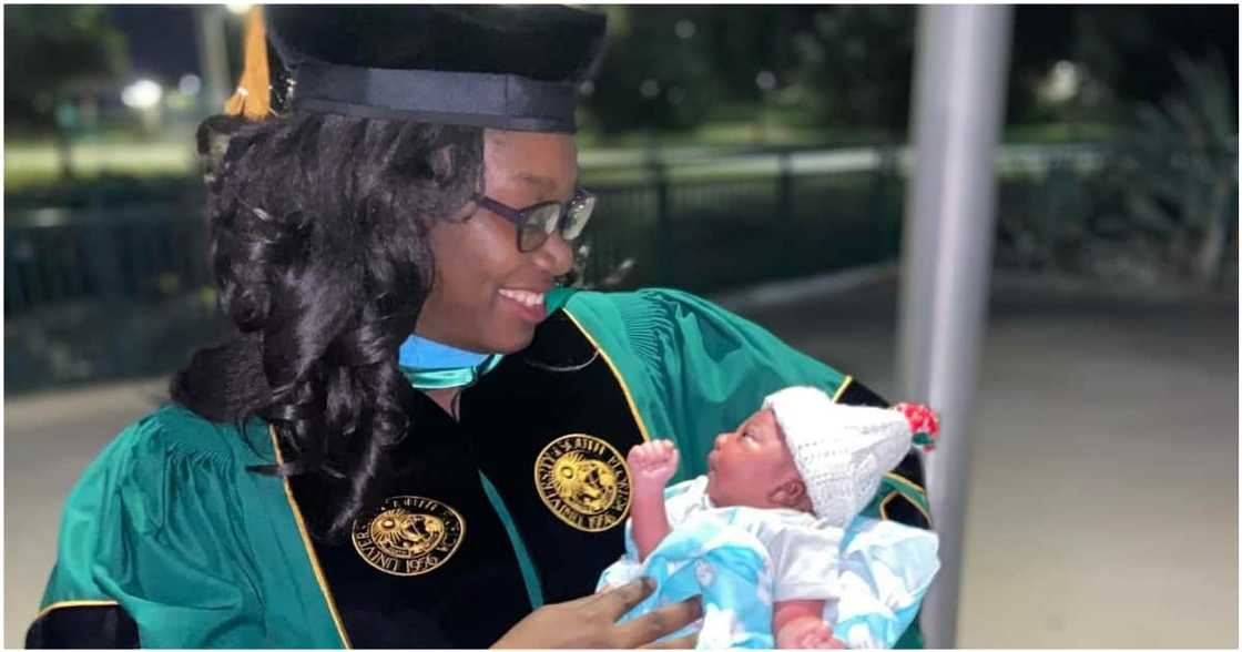 Queshonda Kudaisi with her baby girl at her graduation ceremony.