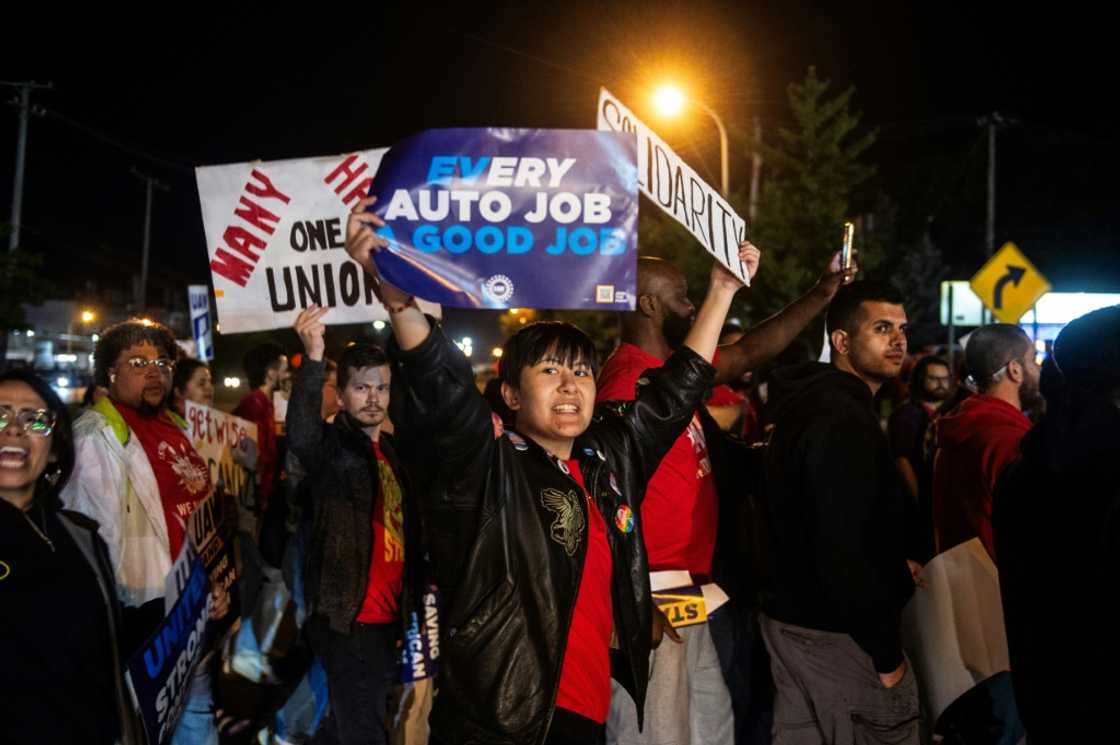 Members of the UAW (United Auto Workers) picket and hold signs outside of the UAW Local 900 headquarters across the street from the Ford Assembly Plant in Wayne, Michigan on September 15, 2023 Members of the UAW (United Auto Workers) picket and hold signs outside of the UAW Local 900 headquarters across the street from the Ford Assembly Plant in Wayne, Michigan on September 15, 2023
