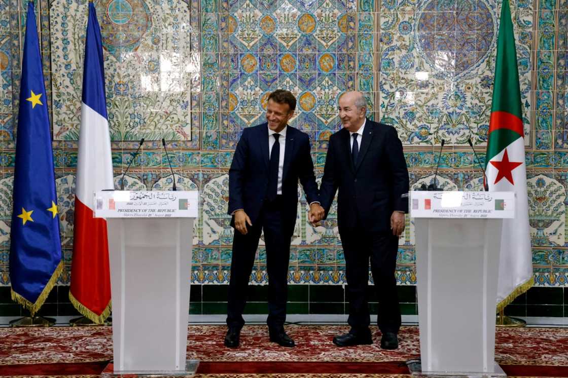 Macron (L), announced a "new page" in ties with Algeria, whose President Abdelmadjid Tebboune (R) is pictured with him at a joint press conference on August 25, 2022 Macron (L), announced a "new page" in ties with Algeria, whose President Abdelmadjid Tebboune (R) is pictured with him at a joint press conference on August 25, 2022