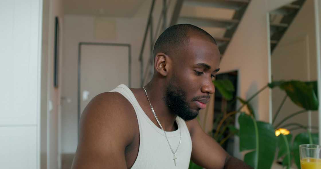 A man having juice at home