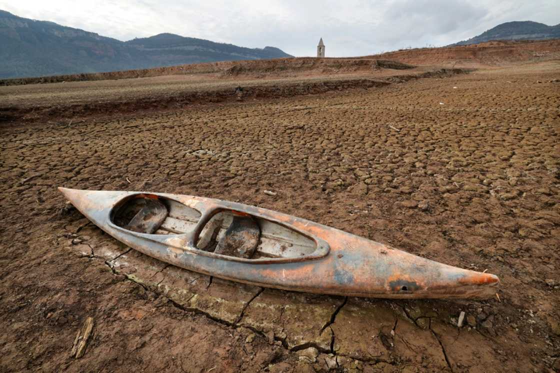 A kayak in a dried-out reservoir in Girona in Catalonia A kayak in a dried-out reservoir in Girona in Catalonia