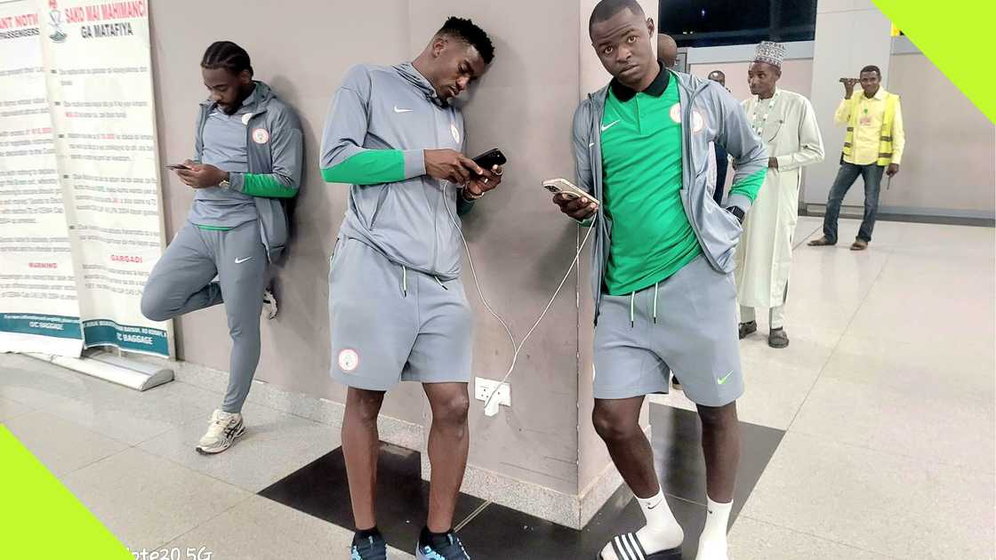 Super Eagles stars at the Aminu Kano International Airport after arriving in Nigeria.