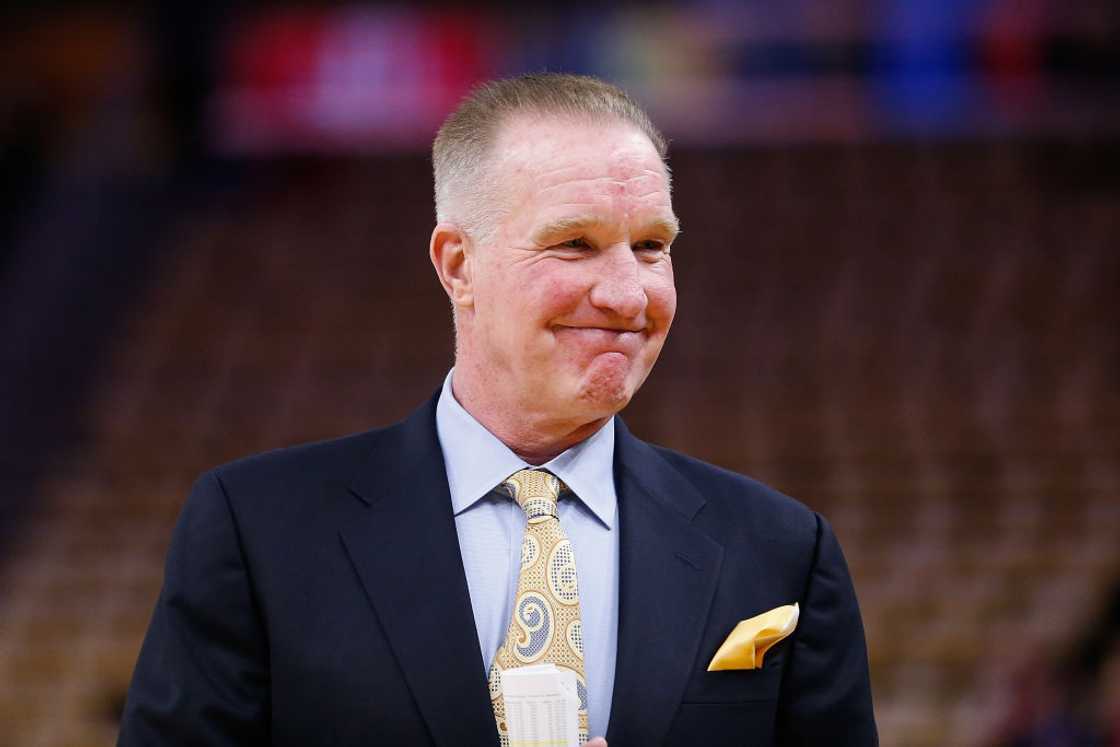 Chris Mullin in a blue suit