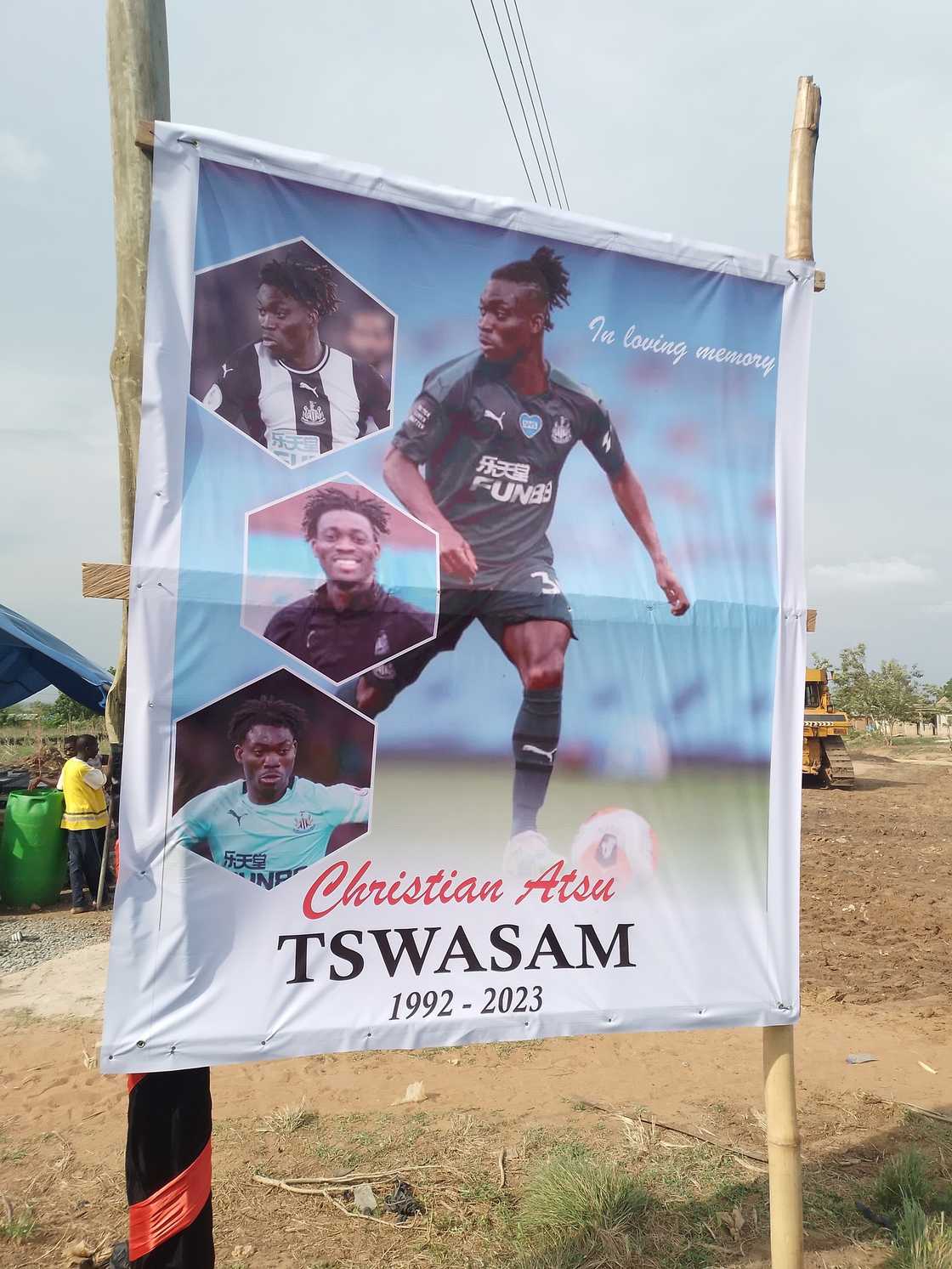 Atsu's banner at his tomb.