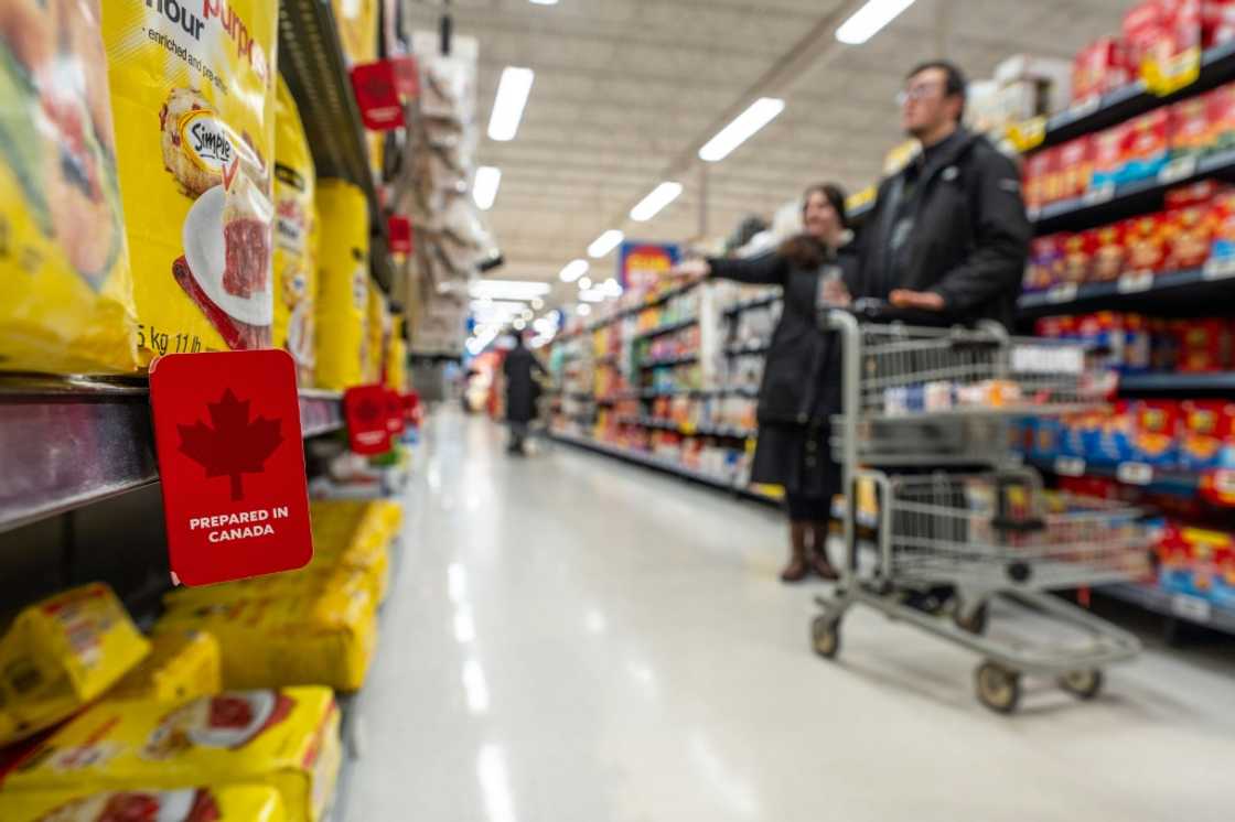 Canadians have seen exports surge but lower household spending as US President Donald Trump's tariffs begin to bite, new government figures show Canadians have seen exports surge but lower household spending as US President Donald Trump's tariffs begin to bite, new government figures show