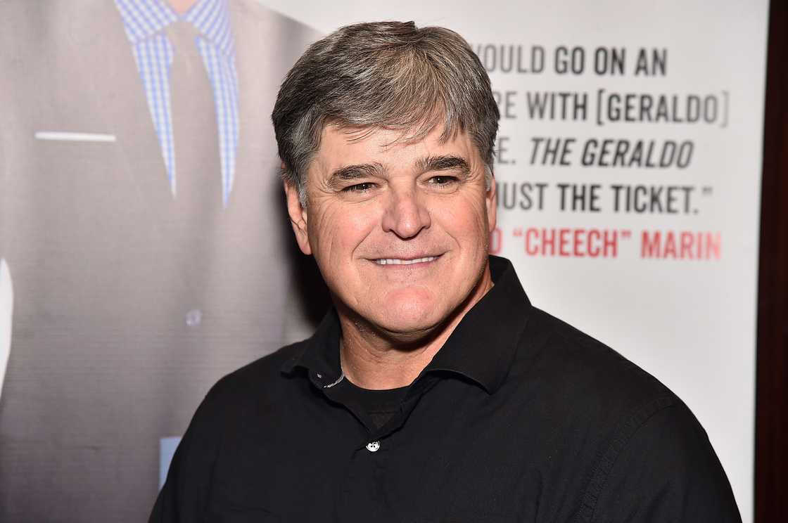 Sean Hannity poses in black at Geraldo Rivera's book launch.