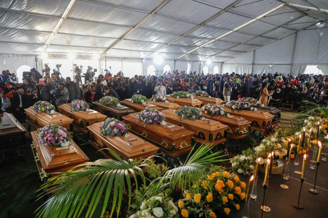 A memorial service for the 21 dead, using empty coffins as symbols of the loss, was held on July 6 A memorial service for the 21 dead, using empty coffins as symbols of the loss, was held on July 6