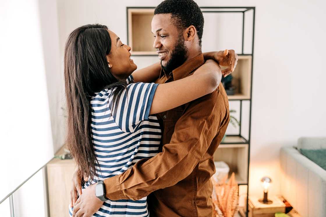 A man and woman hugging A man and woman hugging