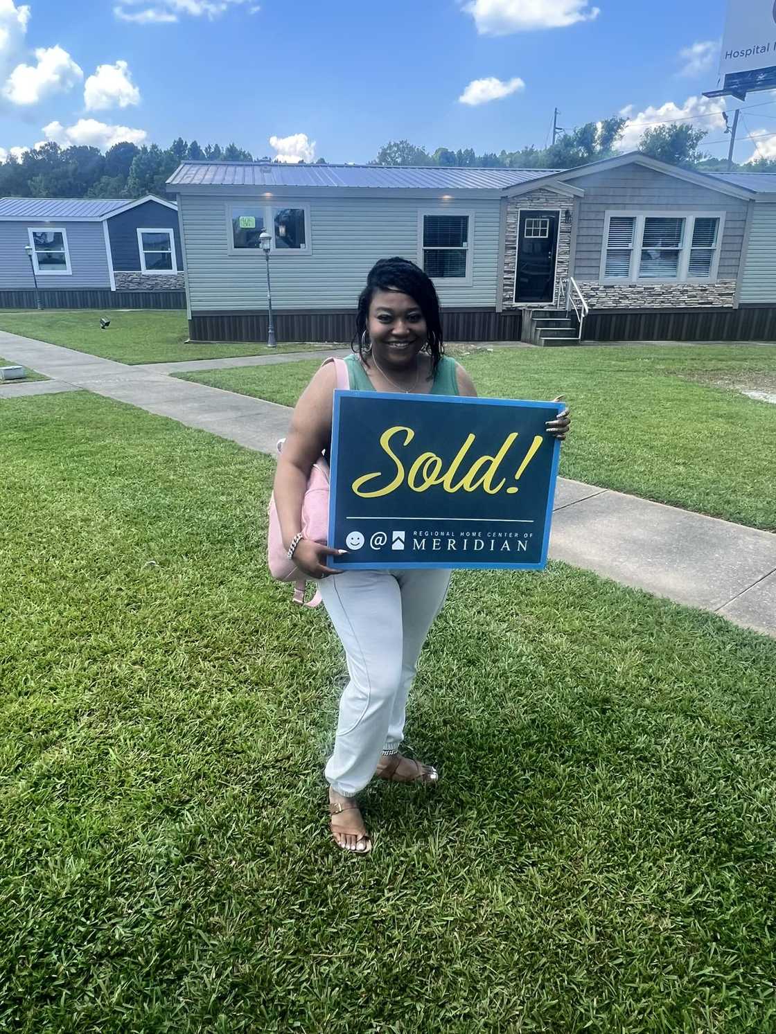 Black lady becomes a home owner. Black lady becomes a home owner.